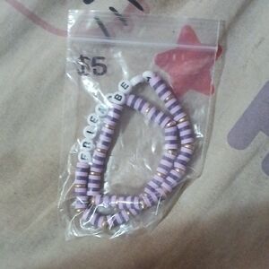 Purple and White Beaded Bracelet